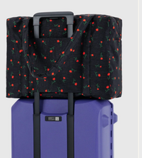 painted wildflower: cloud carry-on BAGGU: